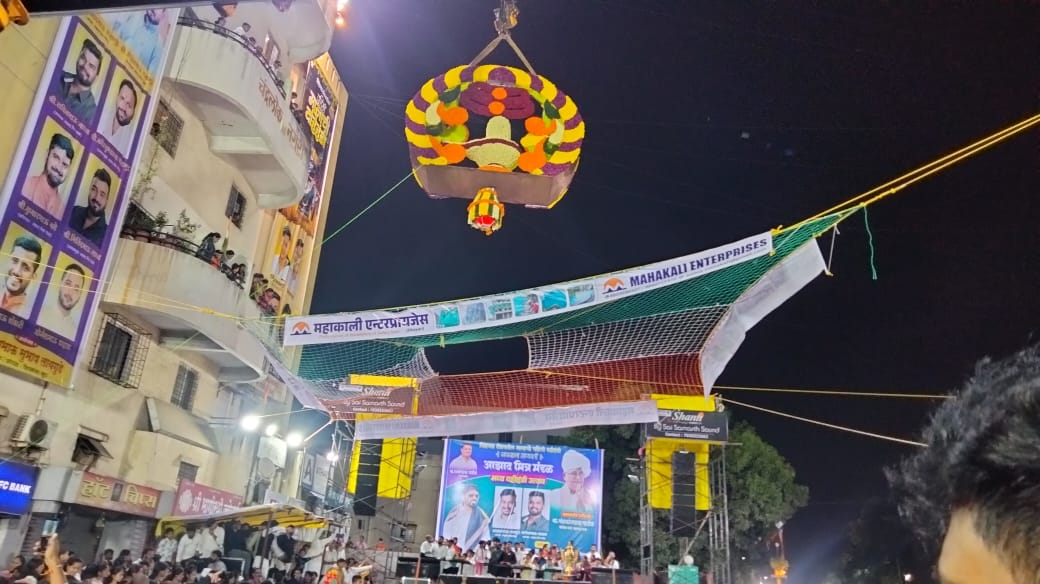 Safety net installation at night Dahi Handi event